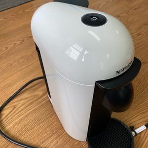 Nespresso - used about 20 times. Plus 40 of 7.7 oz capsules of coffee pods.